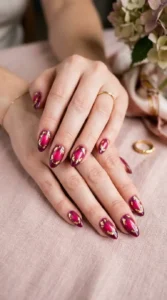Berry Aura Nails with Gold Foil