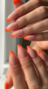 Almond Nude Nails with Ombre Orange Tips