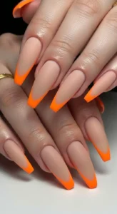 Coffin Nude Nails with Neon Orange Edges