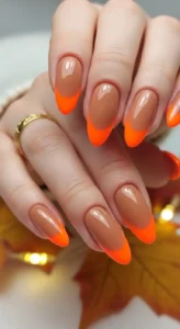 Light Brown Nails with Bright Orange Tips