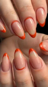 Nude Nails with Orange Reverse Tips